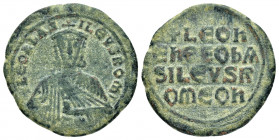 LEO VI.(886-912).Constantinople.Follis.

Obv : + LEOn bAS-ILEVS ROM.
Crowned bust of Leo facing, wearing chlamys, holding akakia in left hand.

Rev : ...