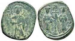 CONSTANTINE X DUCAS.(1059-1067).Constantinople.Follis.

Obv : +EMMA NOVHA.
Christ standing facing on footstool, wearing nimbus and holding Gospels, IC...