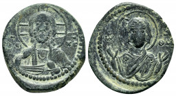 ROMANUS IV.(1068-1071).Anonymous Class G.Constantinople.Follis.

Obv : Bust of Christ facing with nimbate cross, pallium and colobium, and raising rig...