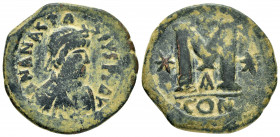 ANASTASIUS I.(491-518).Constantinople.Follis. 

Obv : DN ANASTASIVS PP AVG.
Pearl diademed, draped, cuirassed bust right.

Rev : Large M, star left, c...