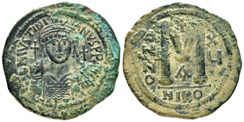 JUSTINIAN I.(527-565).Nicomedia.Follis. 

Obv : DN IVSTINIANVS PP AVG.
Helmeted,...