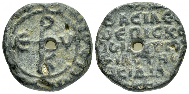 BYZANTINE LEAD SEAL.(Circa 11 th Century).Pb.

Obv : Cruciform invocative monogr...