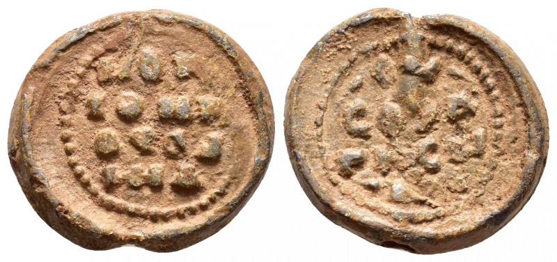 BYZANTINE LEAD SEAL.(Circa 11 th Century).Pb.

Obv : Inscription of four lines.B...