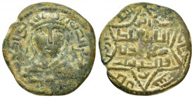 ARTUQID of MARDIN.Husam al Din Yuluq Arslan.(1184-1201).Dirhem.

Obv : Diademed and draped male bust with long hair facing, placing his right hand on ...