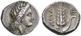 CLASSICAL COINS 
 LUCANIA 
 METAPONTUM 
 Nomos, about 320-280 BC. AR 7.88 g. Head of Kore-Persephone r., crowned with ears of corn; below chin, EU ...