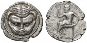 CLASSICAL COINS 
 BRUTTIUM 
 RHEGIUM 
 Tetradrachm, about 460-450 BC. AR 16.58 g. Lion mask facing. Rev. RECIN(retrograd) - OS(retrograd) Iocastes,...