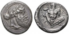 CLASSICAL COINS 
 SICILY 
 NAXOS 
 Tetradrachm, about 461/460 BC. AR 17.18 g. Bearded head of Dionysos r., wearing ivy wreath, hair tied in a kroby...