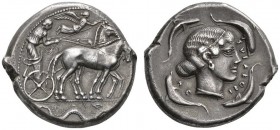 CLASSICAL COINS 
 SICILY 
 SYRACUSE 
 Tetradrachm, about 460-440 BC. AR 17.29 g. Slow quadriga r., charioteer holds reins with both his hands, kent...