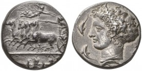 CLASSICAL COINS 
 SICILY 
 SYRACUSE 
 Decadrachm, signed by the master-engraver Kimon, about 410-405 BC. AR 41.05 g. Fast quadriga l., the chariote...