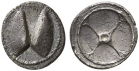 CLASSICAL COINS 
 SICILY 
 CAMARINA 
 Litra, about 480-450 BC. AR 0.60 g. Open mussel, seen from above. Rev. Four-spoked wheel. G. Manganaro, Dai m...