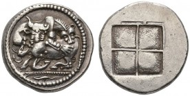 CLASSICAL COINS 
 MACEDONIA 
 ACANTHUS 
 Tetradrachm, about 470 BC. AR 17.26 g. Lioness (?) r., attacking bull kneeling l.; below triple exergual l...