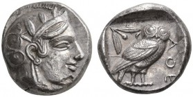 CLASSICAL COINS 
 ATTICA 
 ATHENS 
 Tetradrachm, about 440-435 BC. AR 17.08 g. Head of Athena r., wearing crested Attic helmet decorated with three...