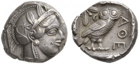 CLASSICAL COINS 
 ATTICA 
 ATHENS 
 Tetradrachm, about 435-425 BC. AR 17.10 g. Head of Athena r., wearing crested Attic helmet decorated with three...