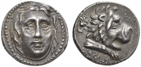CLASSICAL COINS 
 CARIA 
 CNIDUS 
 Didrachm, about 210-185 BC. AR 5.25 g. Facing head of Helios, slightly turned to the r. Rev. KNI Forepart of lio...