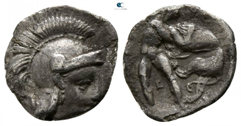 Calabria. Tarentum circa 325-280 BC. 
Diobol AR

11mm., 0,83g.

Head of Ath...
