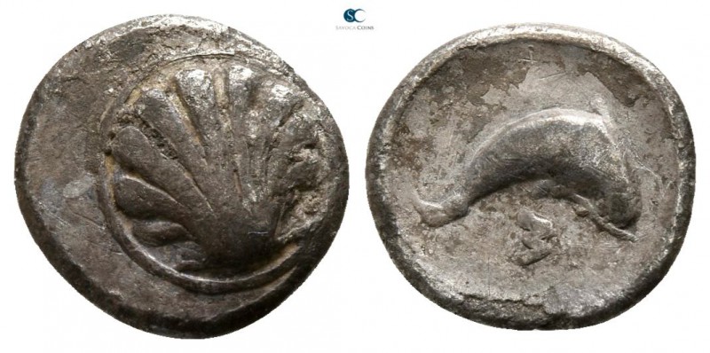Calabria. Tarentum 325-280 BC. 
Litra AR

8mm., 0,73g.

Cockle shell / Dolp...
