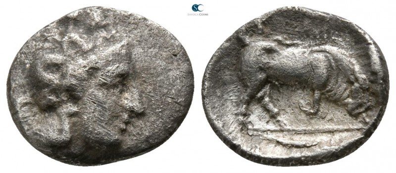 Lucania. Thourioi 400-350 BC. 
Diobol AR

12mm., 1,15g.

Head of Athena rig...