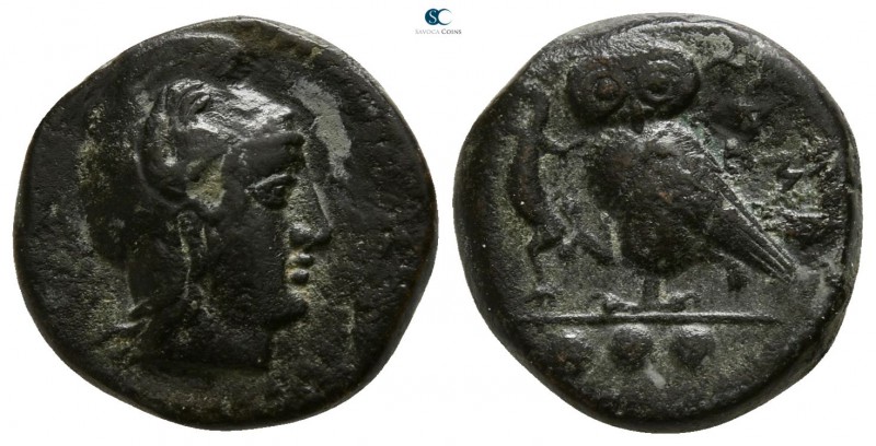 Sicily. Kamarina 425-400 BC. 
Bronze Æ

13mm., 2,85g.

Head of Athena to ri...