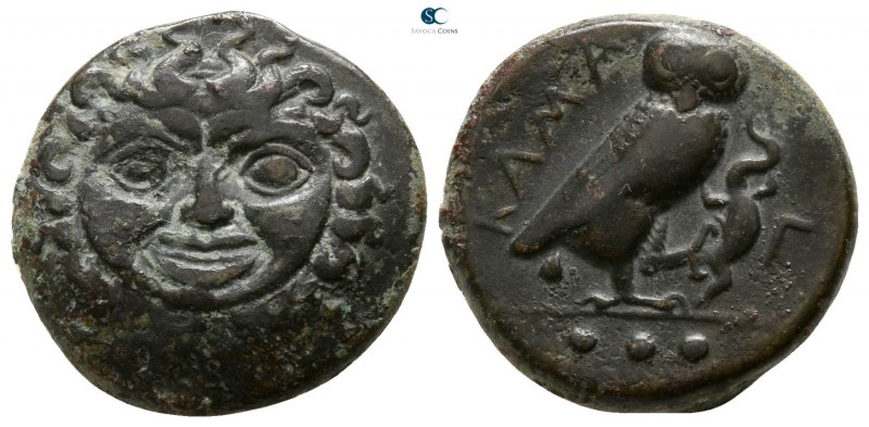 Sicily. Kamarina 425-405 BC. 
Tetras Æ

15mm., 4,39g.

Gorgoneion / KAMA; o...
