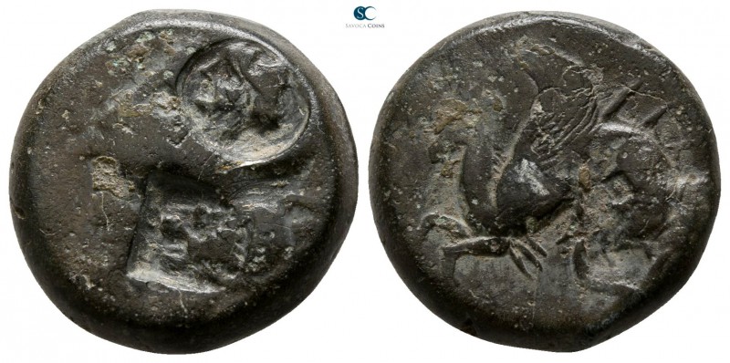 Sicily. Syracuse. Dionysios I. 405-367 BC. 
Litra Æ

15mm., 6,32g.

Helmete...