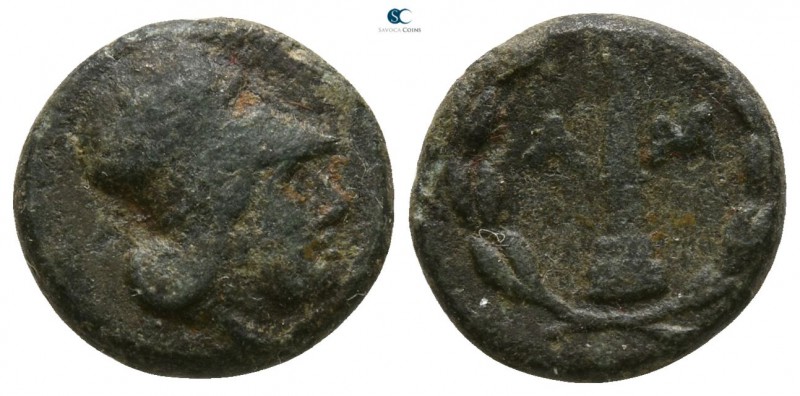 Epeiros. Ambrakia 250-200 BC. 
Chalkous Æ

11mm., 1,84g.

Helmeted head of ...