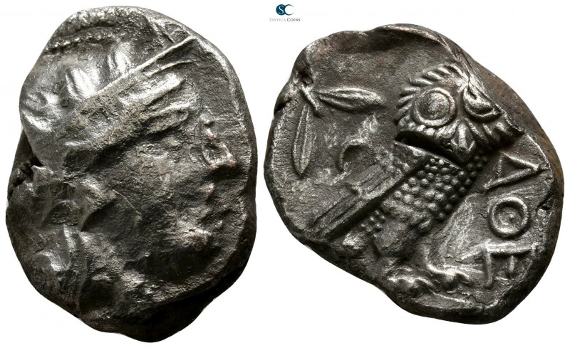 Attica. Athens 353-294 BC. 
Tetradrachm AR

25mm., 16,91g.

Helmeted head o...