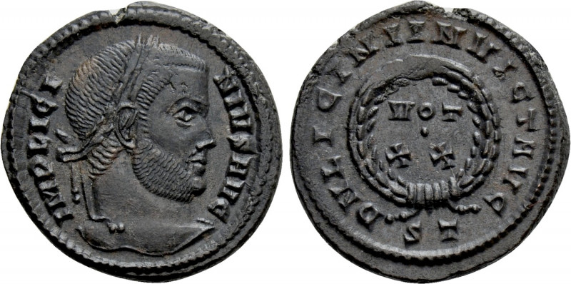 LICINIUS I (308-324). Follis. Ticinum. 

Obv: IMP LICINIVS AVG. 
Laureate hea...