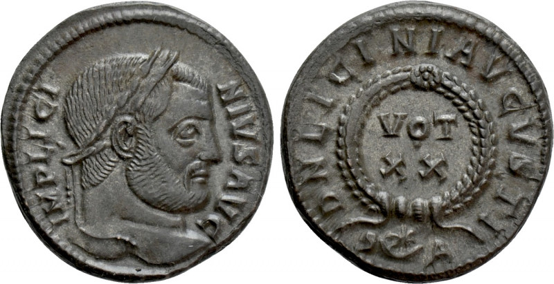 LICINIUS I (308-324). Follis. Arelate. 

Obv: IMP LICINIVS AVG. 
Laureate hea...