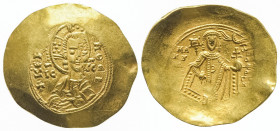 Manuel I Comnéne (1143-1180). Hyperpère (4,56 g) de Constantinople au buste de face du Christ imberbe. R/ L’empereur debout tenant labarum et globe su...