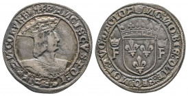 FRANCOIS I (1515-1547). Teston du type Ciani 1112 au buste avec manteau de fourrure (?) et légendes
aux N inversés, (9,30 g.).
Rare et TTB