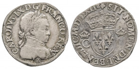 CHARLES IX (1560-1574).
Teston dit morveux au buste du roi à droite, 1562 A (frappe irrégulière des Huguenots) Orléans, (9,57 g.).
Ref : Dy 1073, Cian...