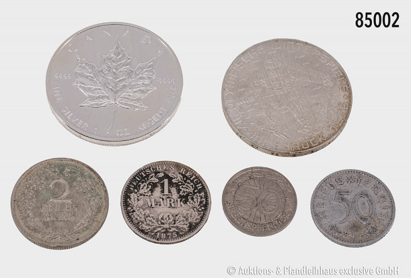 Konv. Verschiedenes, ca. 40 Münzen auf 2 Albumseiten, dabei Kanada Maple Leaf 19...
