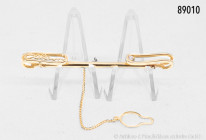 Krawattenhalter, Design von Luigi Colani, 750er Gelbgold, mit 0,08 Karat Brillant, Gesamtgewicht 11,5 g, voll funktionsfähiger Clip-Mechanismus, sehr ...