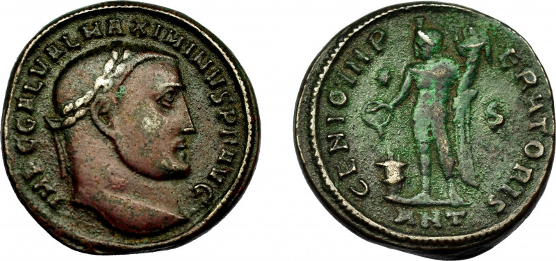 IMPERIO ROMANO. MAXIMINO II. Follis. Antioquia (310). R/ Genius a izq. con cornu...