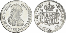 Charles IV
1/2 Real. 1804. MÉXICO. T.H. 1,66 grs. (Hojita en reverso, cuño algo oxidado en anverso). Brillo original. AC-290. SC.