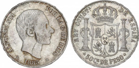 50 Centavos de Peso. 1885. MANILA. (Raya en anverso). Restos de brillo original con ligera pátina irregular. EBC-/EBC.