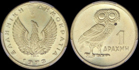 GREECE: 1 Drachma (1973) in nickel-brass with phoenix and inscription "ΕΛΛΗΝΙΚΗ ΔΗΜΟΚΡΑΤΙΑ". Owl on reverse. Inside slab by PCGS "MS 65 / Owl". Cert n...