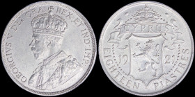 CYPRUS: 18 Piastres (1921) with crowned bust of King George V facing left. Crowned Arms divide date and denomination below on reverse. Inside slab by ...