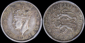 CYPRUS: 4- 1/2 Piastres (1938) in silver (0,925) with crowned head of King George VI facing left. Two stylized rampant lions left, date and denominati...