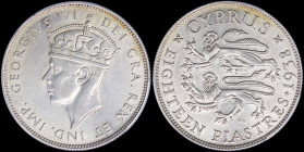 CYPRUS: 18 Piastres (1938) in silver (0,925) with crowned head of King George VI facing left. Two stylized rampant lions left, date and denomination o...