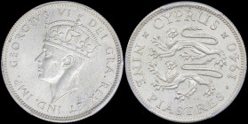 CYPRUS: 9 Piastres (1940) in silver (0,925) with crowned head of King George VI facing left. Two stylized rampant lions and date on reverse. Inside sl...