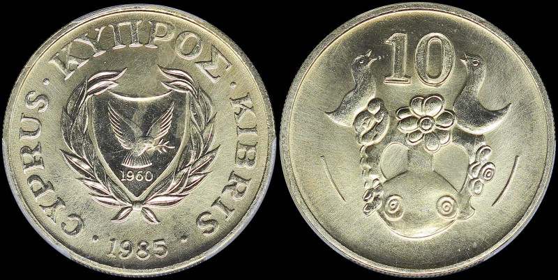 CYPRUS: 10 Cents (1985) in nickel-brass with shielded Arms within wreath and dat...