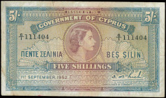 GREECE: 5 Shillings (1.9.1952) in brown, violet and blue with portrait of Queen Elizabeth II at center. S/N: "G/I 111404". Washed and pressed. (Pick 3...