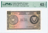 GREECE: 1 Pound (1.12.1961) in brown on multicolor with Arms at right and map of Cyprus at lower right. S/N: "A/8 128534". WMK: Eagle head. Printed by...