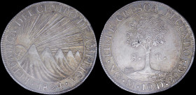 CENTRAL AMERICAN REPUBLIC: 8 Reales (1824 NG M) in silver (0,903) with five mountains and sun with full face. Tree divides donomination on reverse. In...