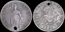 PERU: 8 Reales (1834LIMAE MM) in silver (0,903) within medium wreath above Arms within sprigs. Standing Liberty on reverse. Holed. (KM 142.3). Very Go...