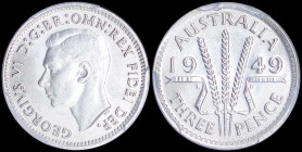 AUSTRALIA: Threepence {1949(m)} in silver (0,500) with head of George VI facing left. Three wheat stalks divide date on reverse. Inside slab by PCGS "...
