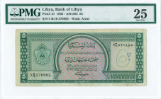LIBYA: 5 Pounds (AH1382 / Law 1963) in green on multicolor unpt with crowned Coat of Arms at left. S/N: "5 B/16 570885". WMK: Coat of Arms. Inside hol...