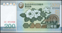 NORTH KOREA: 200 Won (2005) in green on multicolor unpt with flower at center. S/N: "LC 071850". WMK: Small winged horse (Chollima). (Pick 48a) & (Spi...