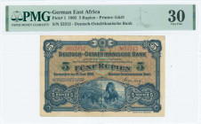 GERMAN EAST AFRICA: 5 Rupien (15.6.1905) in blue on brown and multicolor unpt with two lions at bottom center. S/N: "52312". Printed by G&D. Inside ho...
